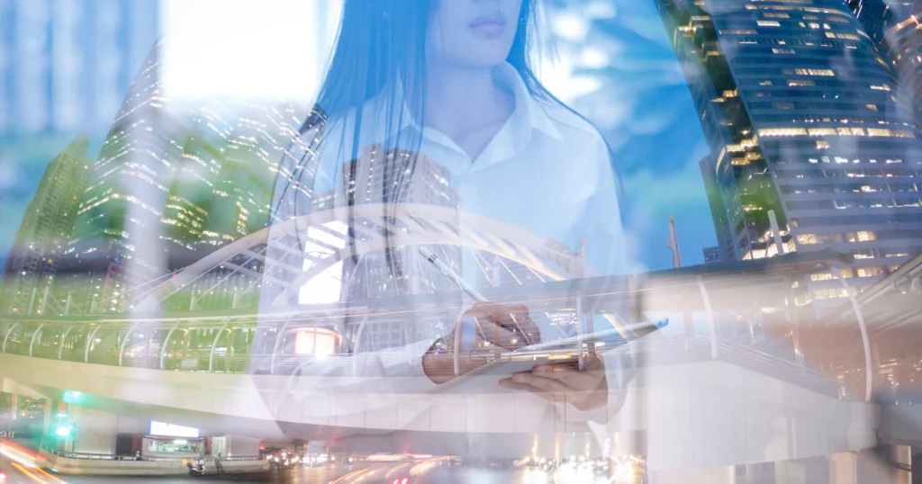 Woman reflected in a city window